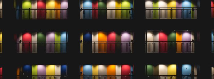 multi-colored-lighted-doors-dark-night