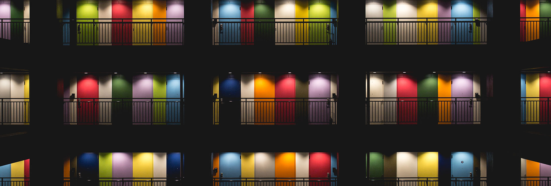 multi-colored-lighted-doors-dark-night