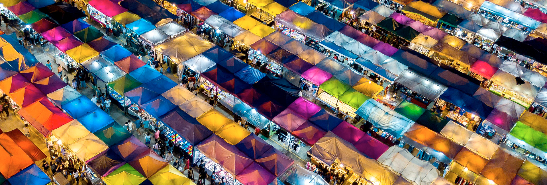 multicolored-marketplace-tents-night-time