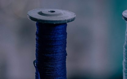 gold-blue-spools-of-thread