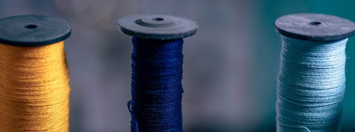 gold-blue-spools-of-thread