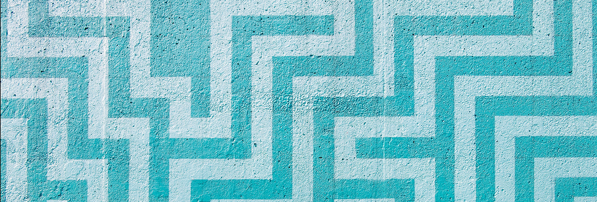 teal-labryrinth-painted-on-concrete