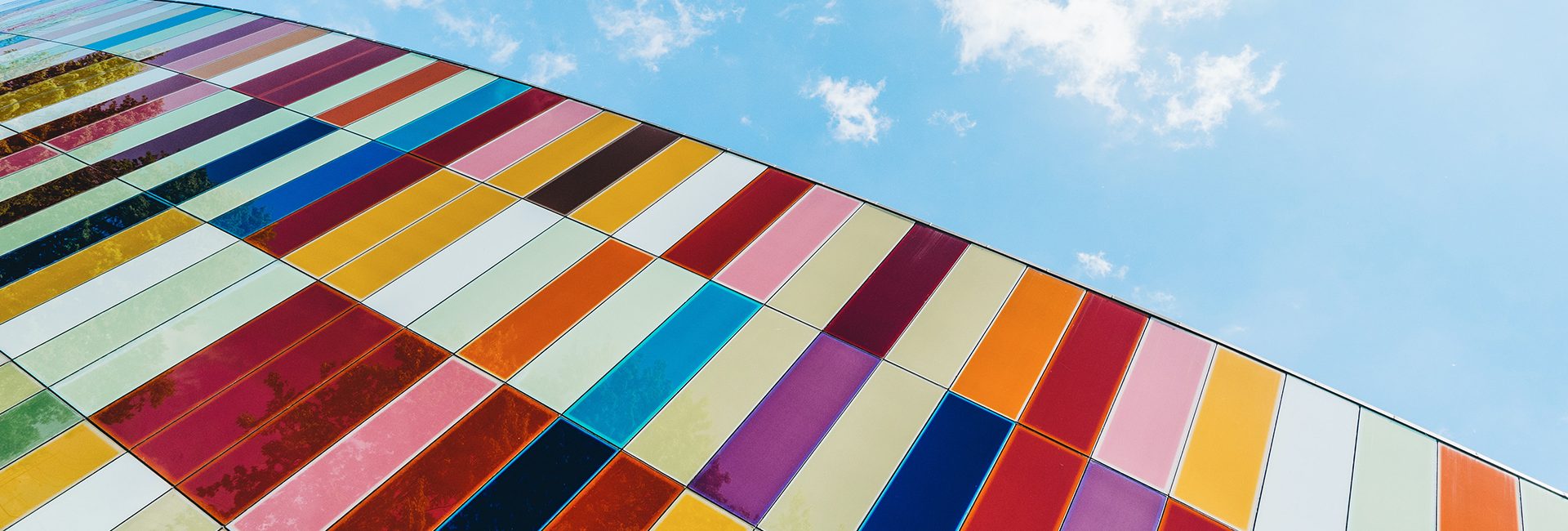 colorful-rectangles-building-against-blue-sky