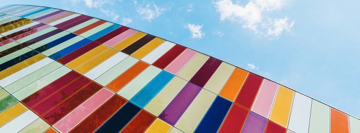 colorful-rectangles-building-against-blue-sky