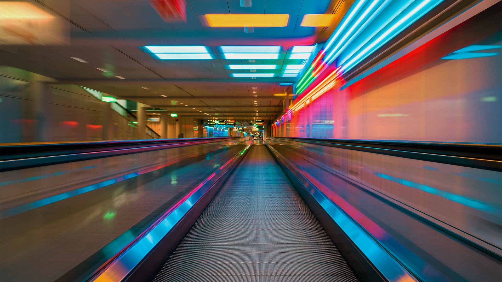 Walking escalator, bright colors, Munich airport