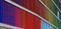 A building with colorful panels extending out