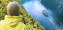 Person looks over a waterway in Norway