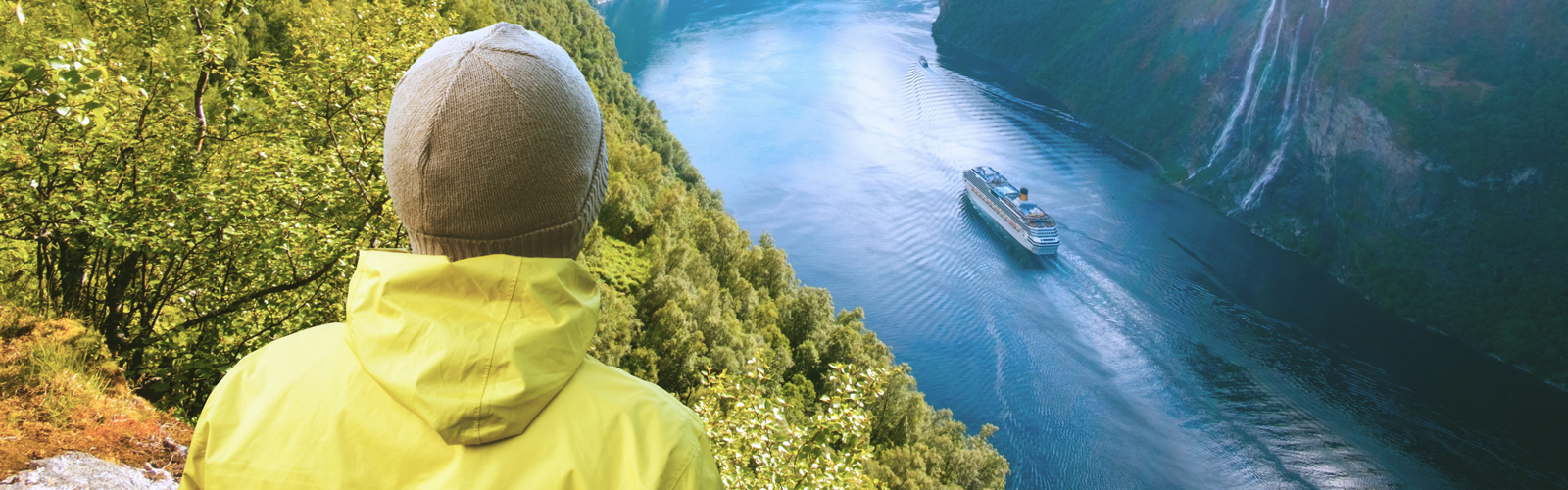 Person looks over a waterway in Norway