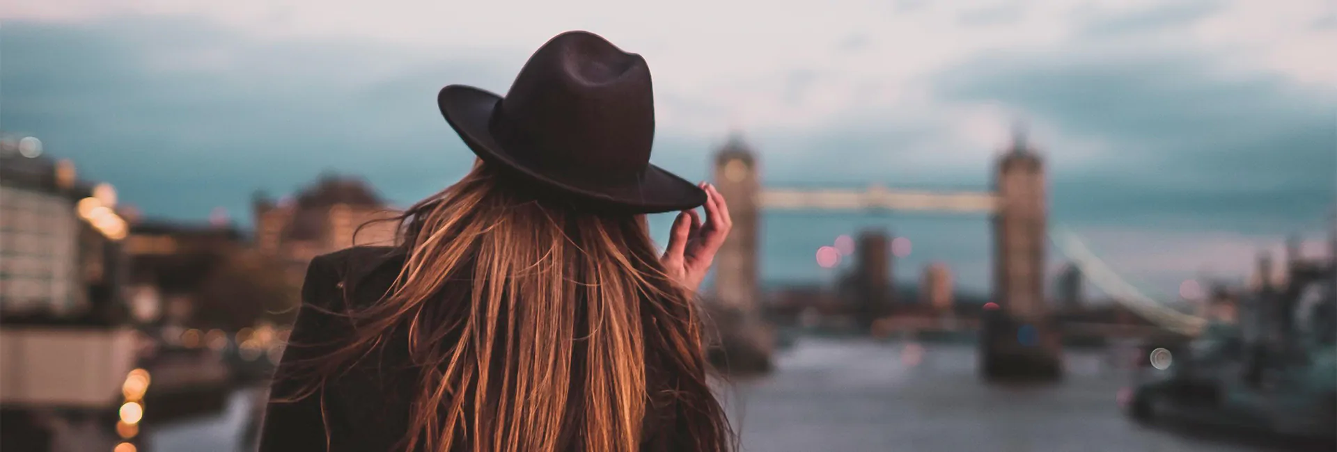 woman-wearing-hat-tower-bridge