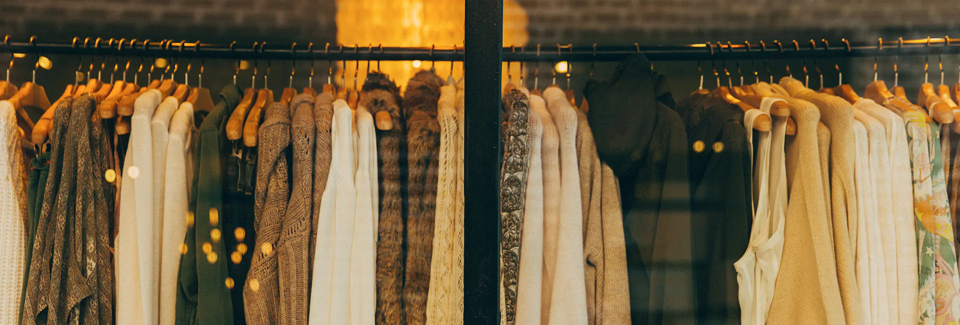 clothes-hanging-in-shop-window