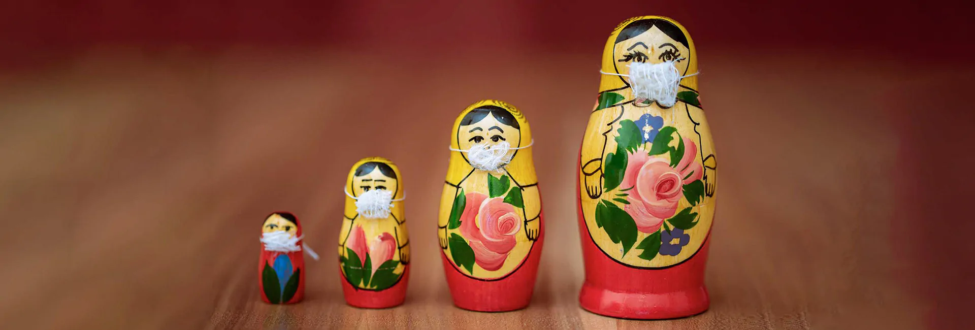 russian-stacking-dolls-wearing-masks