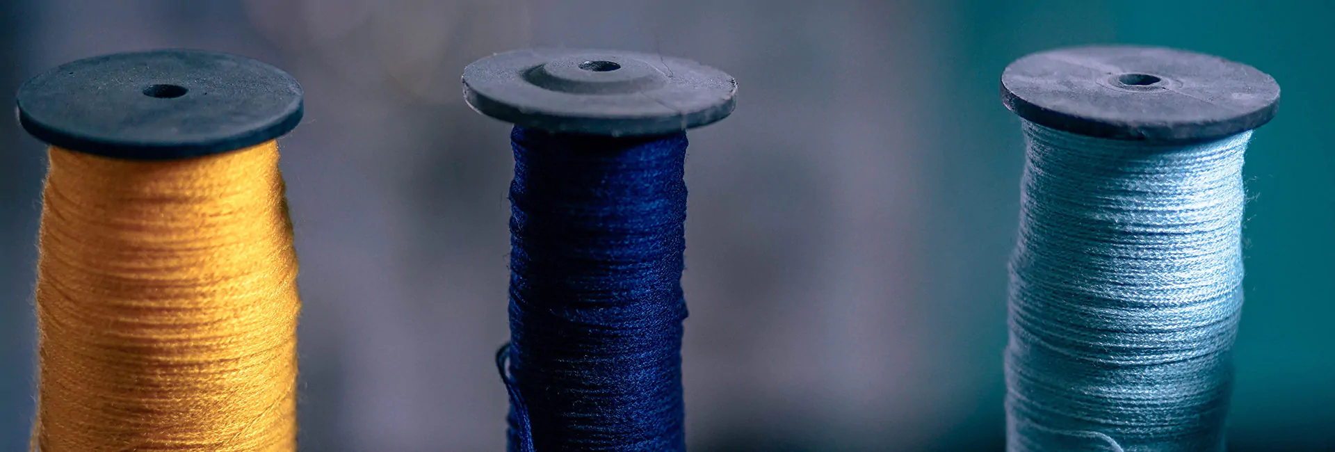 gold-blue-spools-of-thread