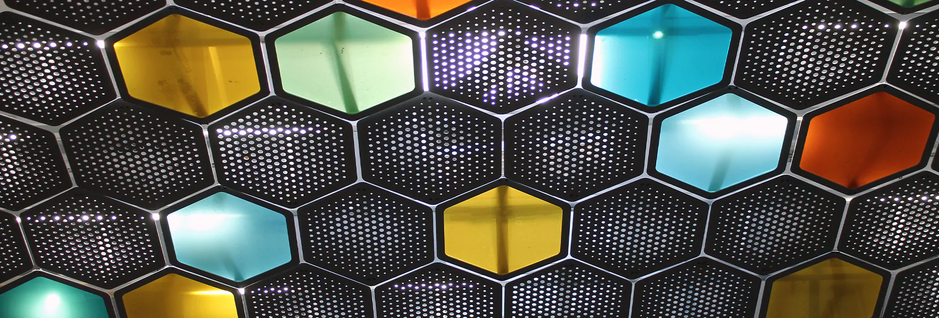 A close up of a wall made of hexagonal tiles photo