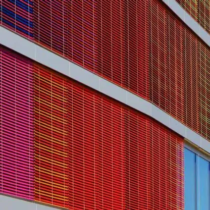 A building with colorful panels extending out