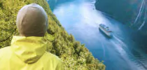 Person looks over a waterway in Norway